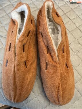 House Slippers. Tan suede like uppers.  Rubber soles. Shearling inside.Size 39